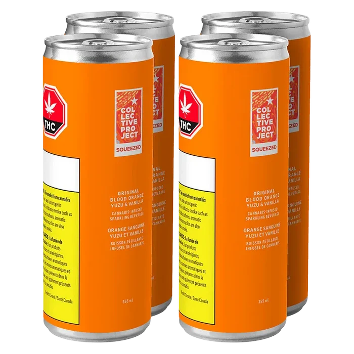 Three-quarter front view of four bright orange Original Blood Orange Yuzu & Vanilla Sparkling Juice cans grouped on a white background.