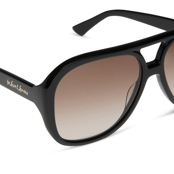 for love & lemons x diff eyewear featuring the pauline aviator sunglasses with a black acetate frame and brown gradient lenses detailed view