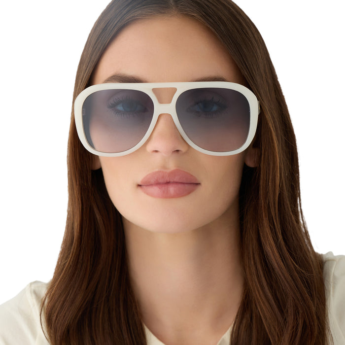 on model - female wearing for love & lemons x diff eyewear featuring the pauline aviator sunglasses with a meringue acetate frame and blue gradient lenses front view