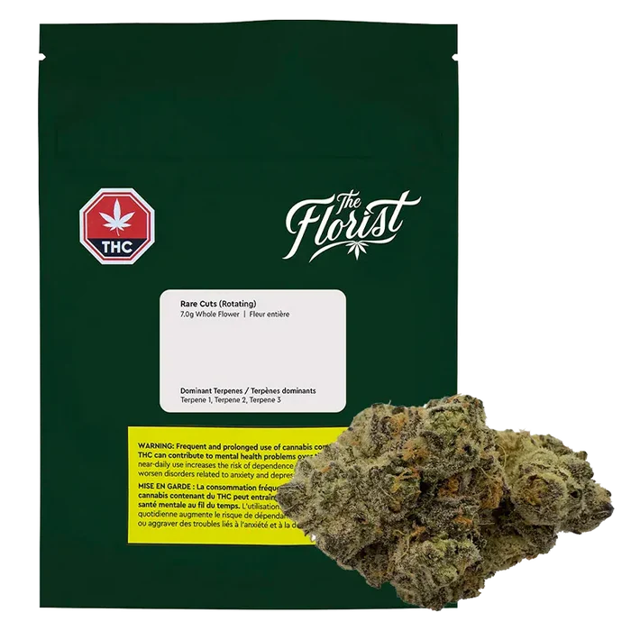 Front-facing shot of the dark green pouch and visible bud labeled Rare Cuts, with "The Florist" logo centered above the white product label.