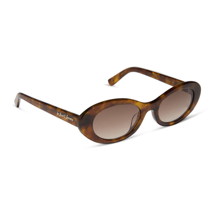for love & lemons x diff eyewear featuring the sabrina oval sunglasses with a honey tortoise acetate frame and brown gradient lenses angled view