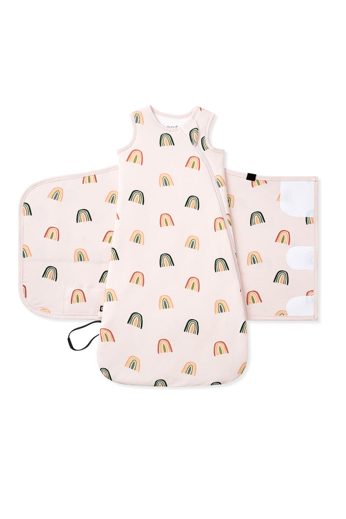 Vanilla Cream Sleep Bag Swaddler in Retro Rainbow 1.0 shown unswaddled on a white background