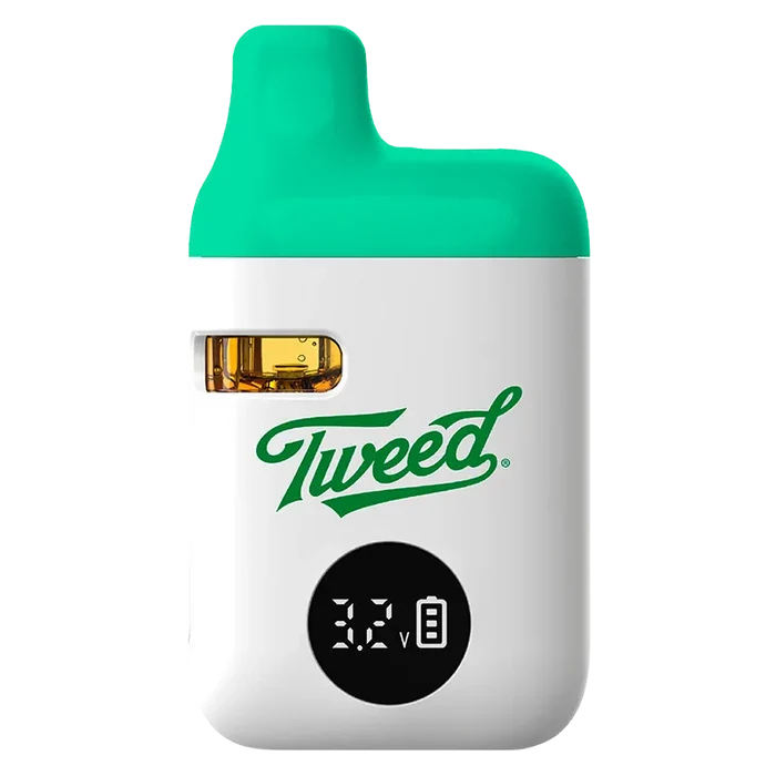 Front view of the Sour Green Apple Liquid Diamonds Disposable Vape by Tweed showing its white body, green mouthpiece, visible oil window and digital voltage display.