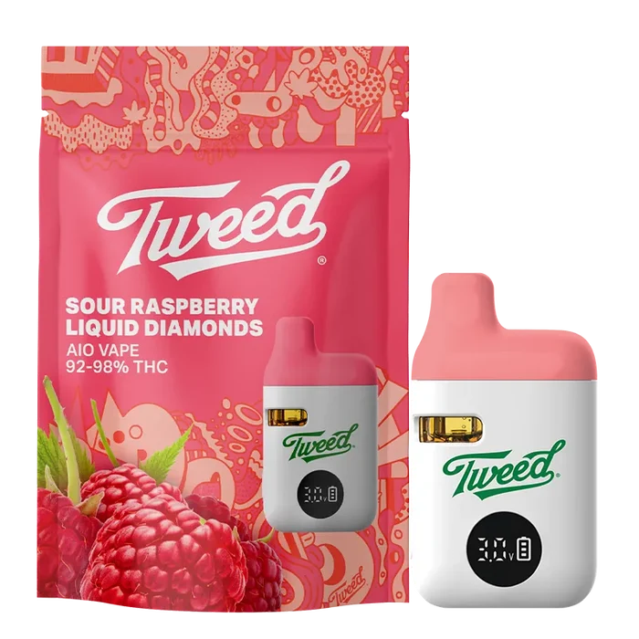 Front-facing shot of the Sour Raspberry Liquid Diamond Vape Cartridge by Tweed, with a white and pink pod beside its pink berry-patterned packaging.