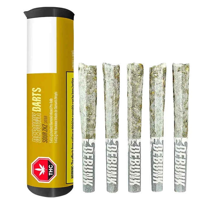 Studio-lit front view of a yellow tube beside five powdered, diamond-coated pre-rolls labeled "DEBUNK," titled Sour Zkz Bubble Hash Coated Infused PR 5 x 0.5 g