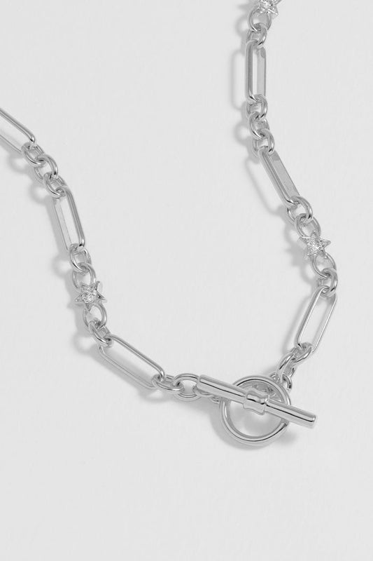 Silver chain bracelet with a toggle clasp on a white background