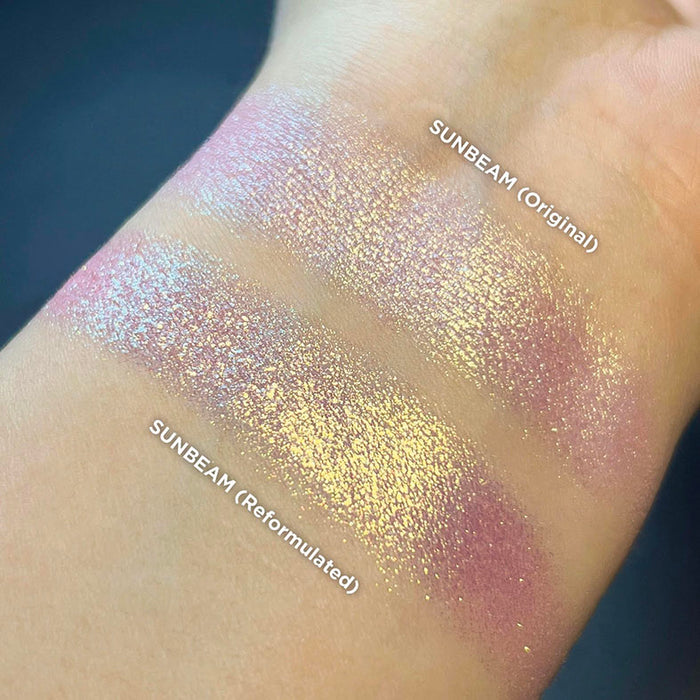 Arm swatch comparison of Sunbeam (original) and Sunbeam (reformulated) on fair skin tone