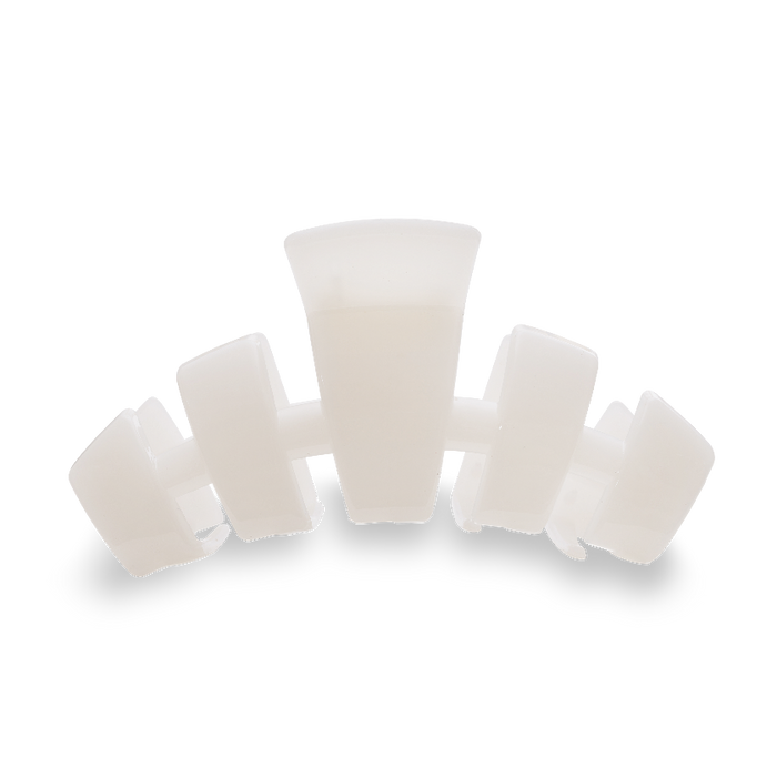 Set of white silicone cups on a white background