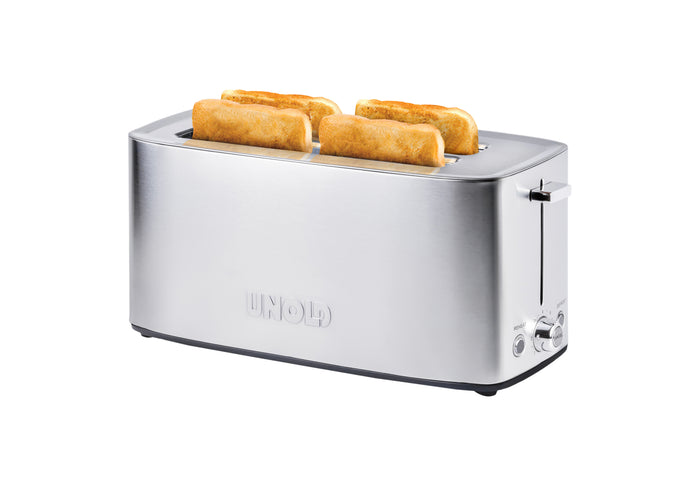 Der Unold Toaster Tom, ein Toaster aus Edelstahl mit vier Schlitzen, ist auf dem Foto mit einem gerösteten Hotdog-Brötchen in jedem Schlitz vor einem weißen Hintergrund abgebildet.