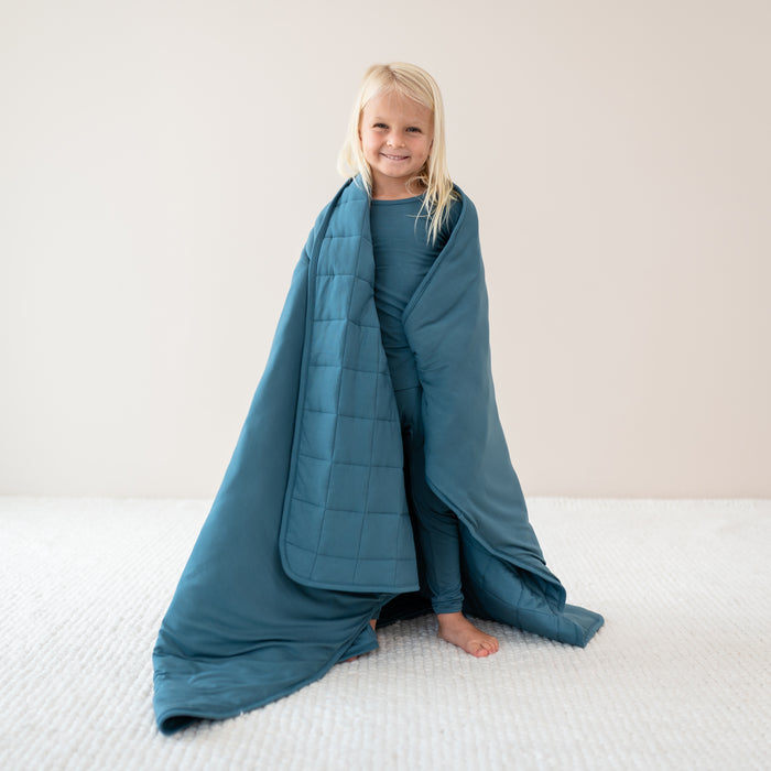 Child wrapped in Toddler Blanket in Atlantic 2.5