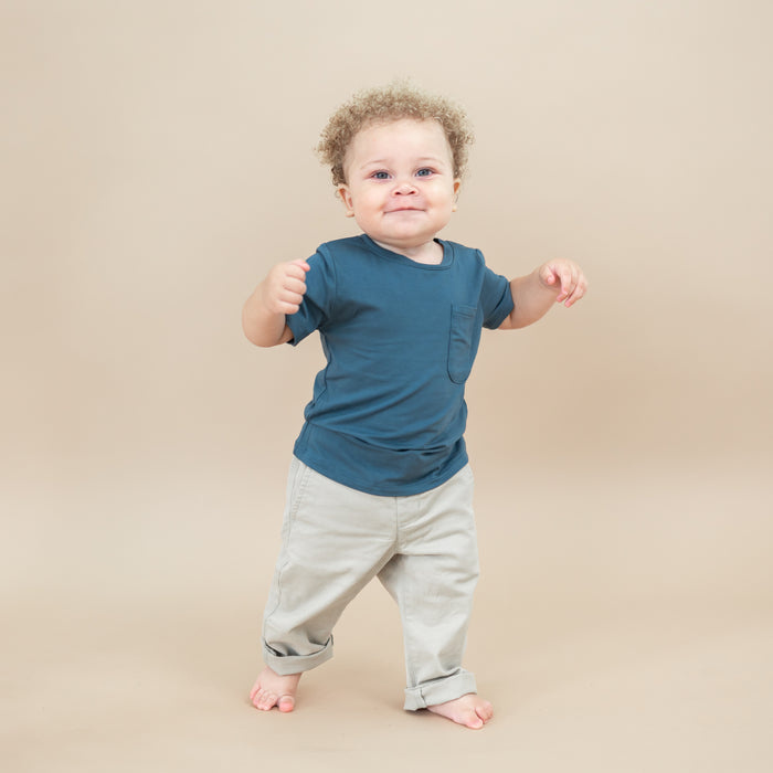 Toddler walking wearing the Toddler Crew Neck Tee in Atlantic with khaki colored pants