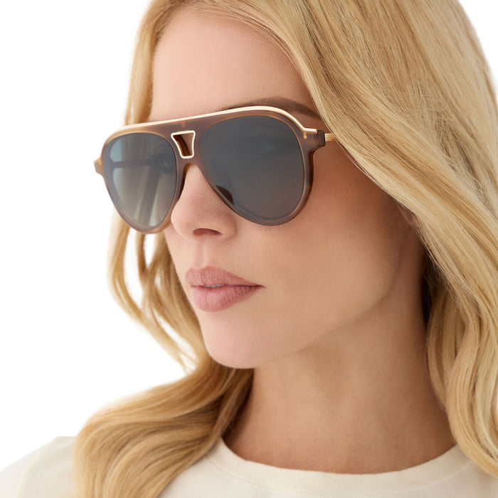 on model - female wearing diff eyewear featuring the tosca iii aviator sunglasses with a tawny brown tortoise frame and brown gradient polarized lenses angled view
