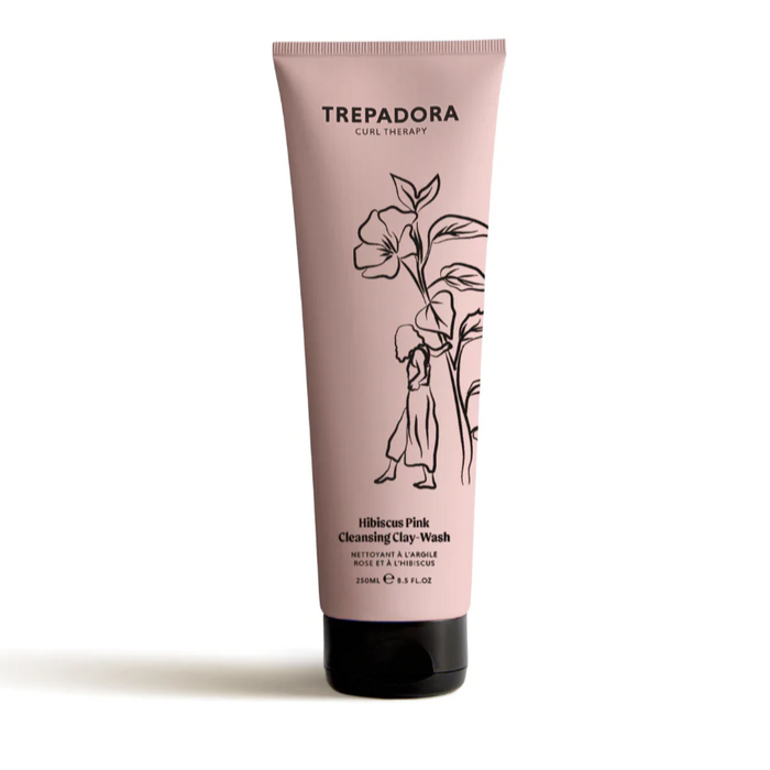 A tube of Trepadora Hibiscus Pink Cleansing Clay-Wash with a floral design on the packaging.