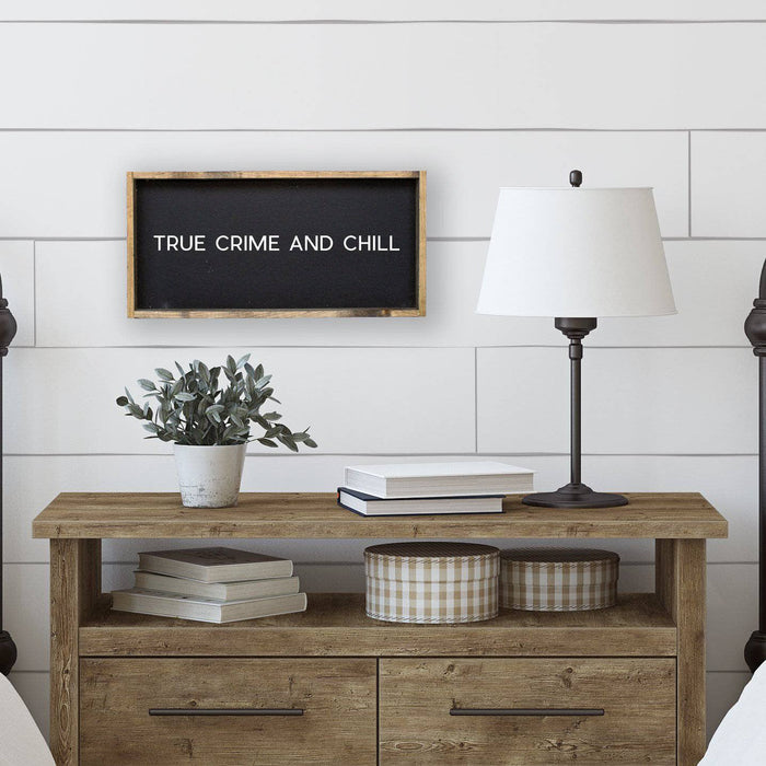 true crime and chill black sign