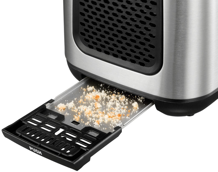 Eine Nahaufnahme des Unold Turbo Toasters B-Ware zeigt die herausgezogene schwarze Kunststoff-Krümelschublade mit der Aufschrift „PUSH“, die die gesammelten Brotkrümel freigibt. Der Toaster verfügt über ein Edelstahlgehäuse.