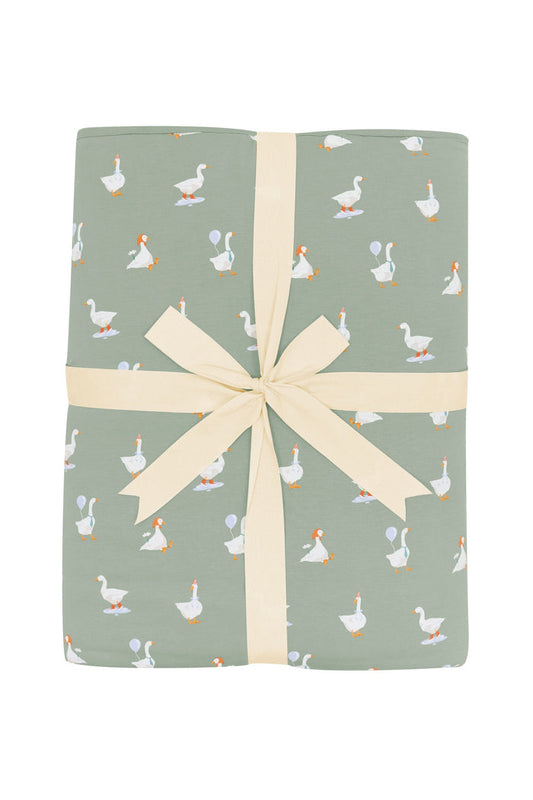 Product photo of the Youth Blanket in Silly Goose 2.5 shown wrapped in its bow packaging