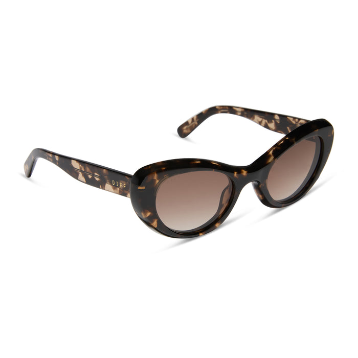 diff eyewear featuring the zaria cat eye sunglasses with a espresso tortoise frame and brown gradient lenses angled view