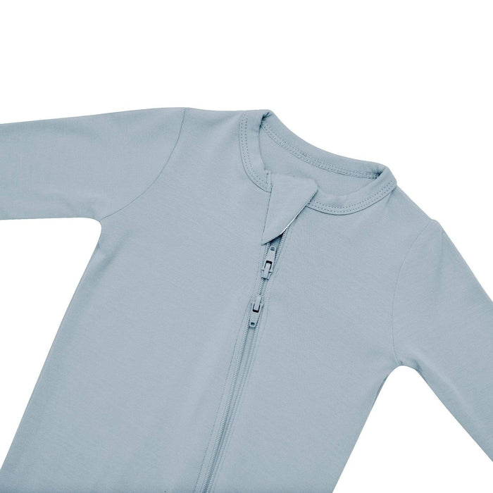 Zipper garage and close up of the double zipper on Kyte Baby Zippered Footie in Fog