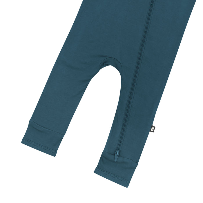 Close up of bottom zipper on the leg of the Zippered Romper in Atlantic