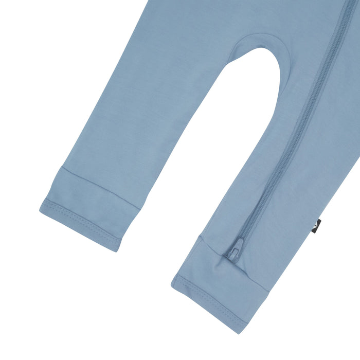 Close up of footless legs and bottom zipper on the Zippered Romper in Slate