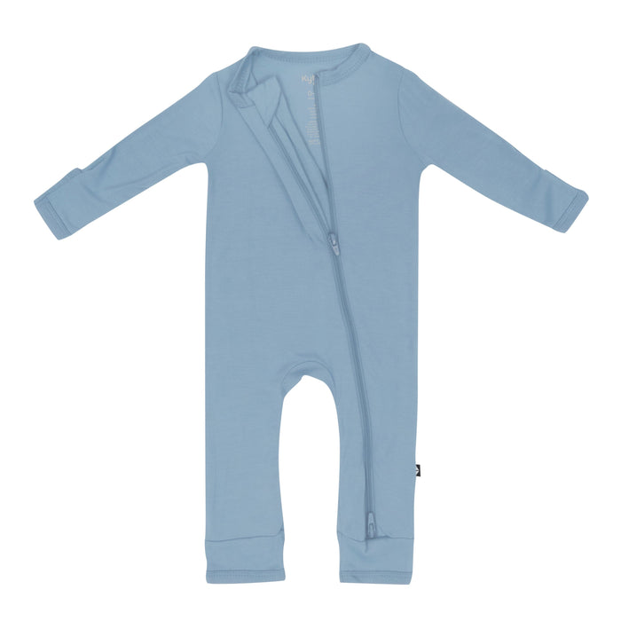 Dual zipper partially unzipped from the top on the  Zippered Romper in Slate